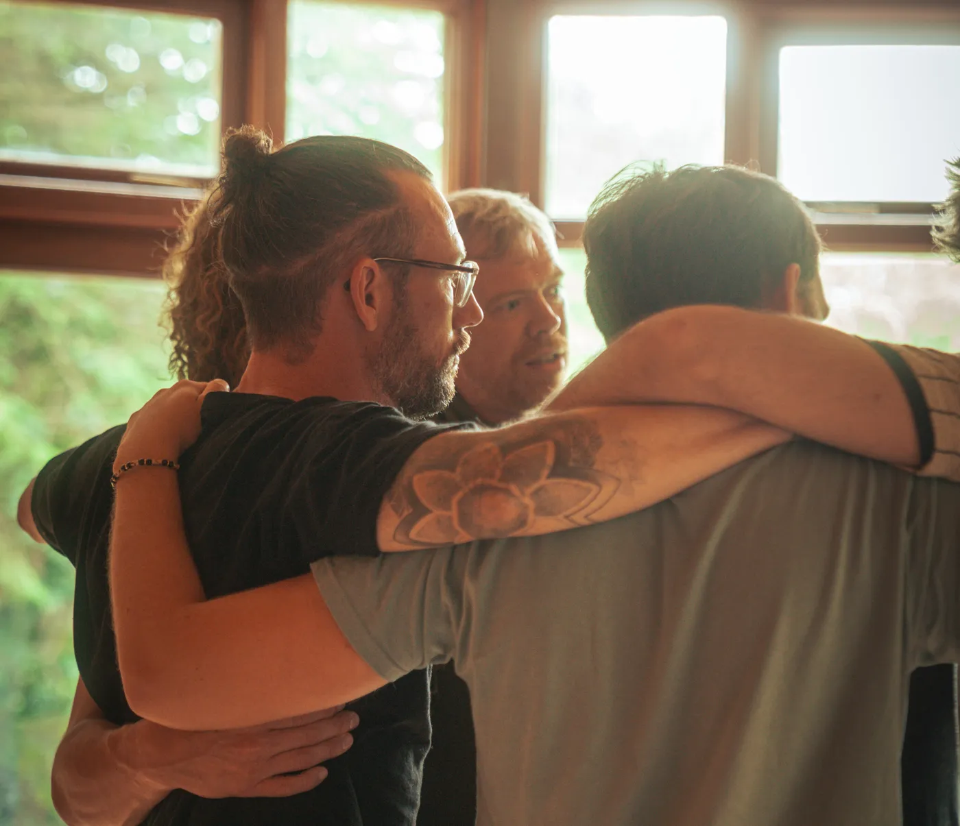 Men embracing