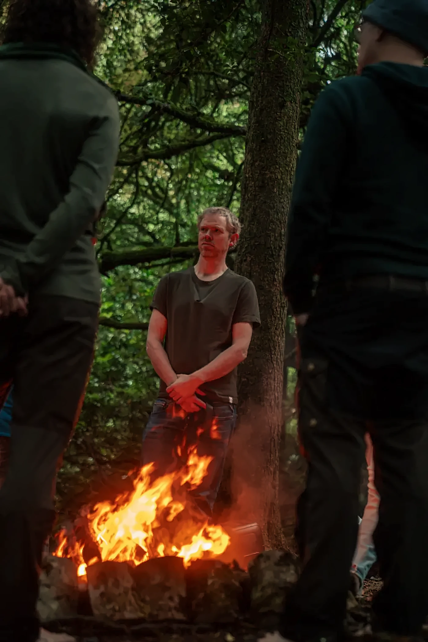 Niall at the fire in the woods